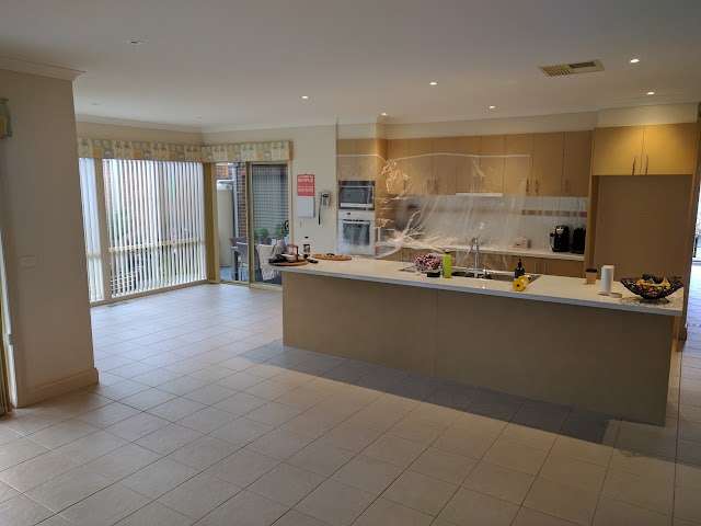 Country Oak Installed Over Tiles project photo 3