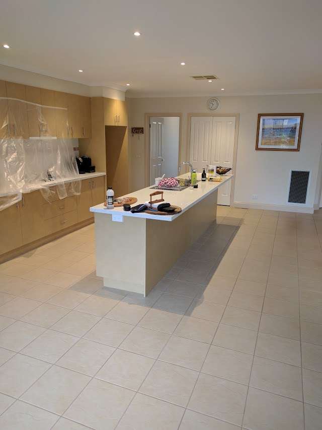 Country Oak Installed Over Tiles project photo 7