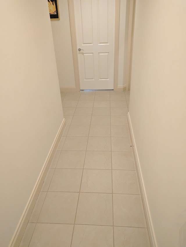 Country Oak Installed Over Tiles project photo 8