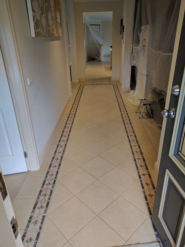 Country Oak Installed Over Tiles project photo 9