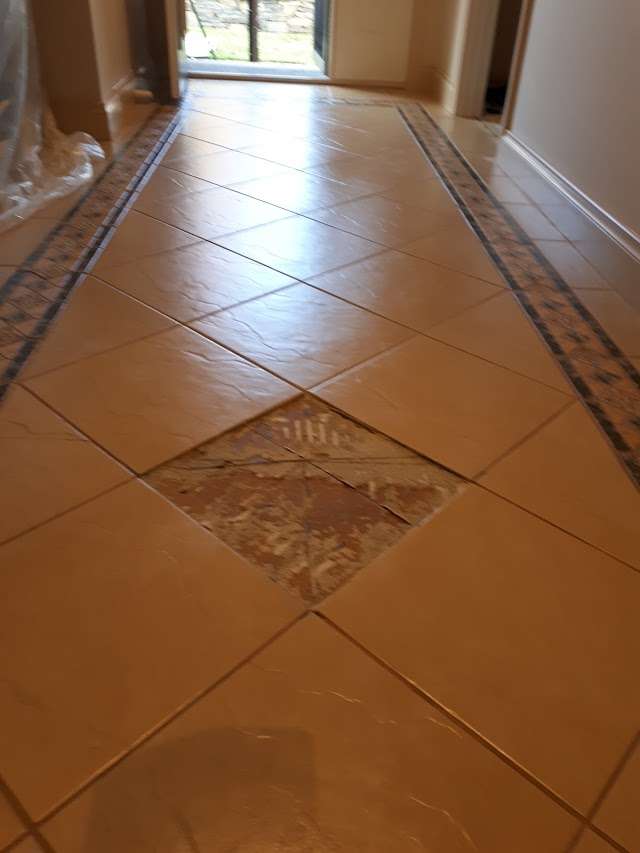 Country Oak Installed Over Tiles project photo 10
