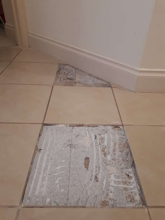 Country Oak Installed Over Tiles project photo 12
